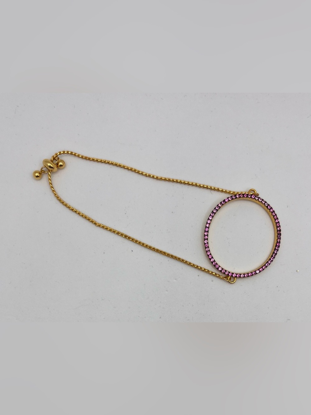Gold-Tone Bracelet with Pink Crystal Circle Pendant